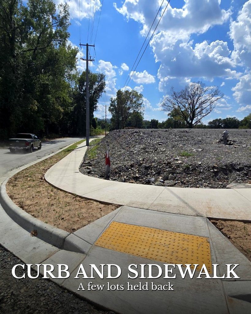 Finished Concrete Curb, Sidewalk and Utilities