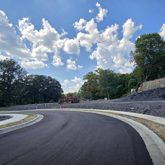 Finished S-Curve on Emerald Drive with Concrete Curbs and Sidewalks